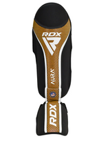 RDX chrániče holení a nártů Aura+ T17, černo-zlaté